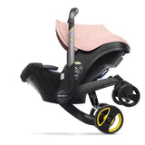 Doona™ Car Seat & Stroller - Blush Pink Inc FREE Vehicle Seat Protector Worth £29.95!